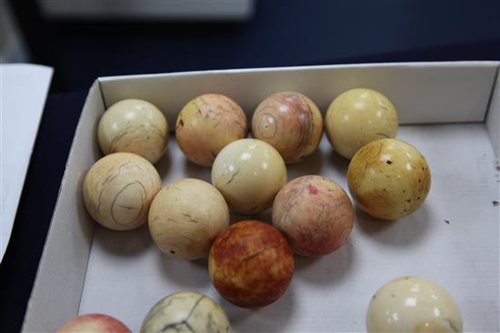 A collection of twenty early 20th century ivory snooker balls, each approx. 2in.